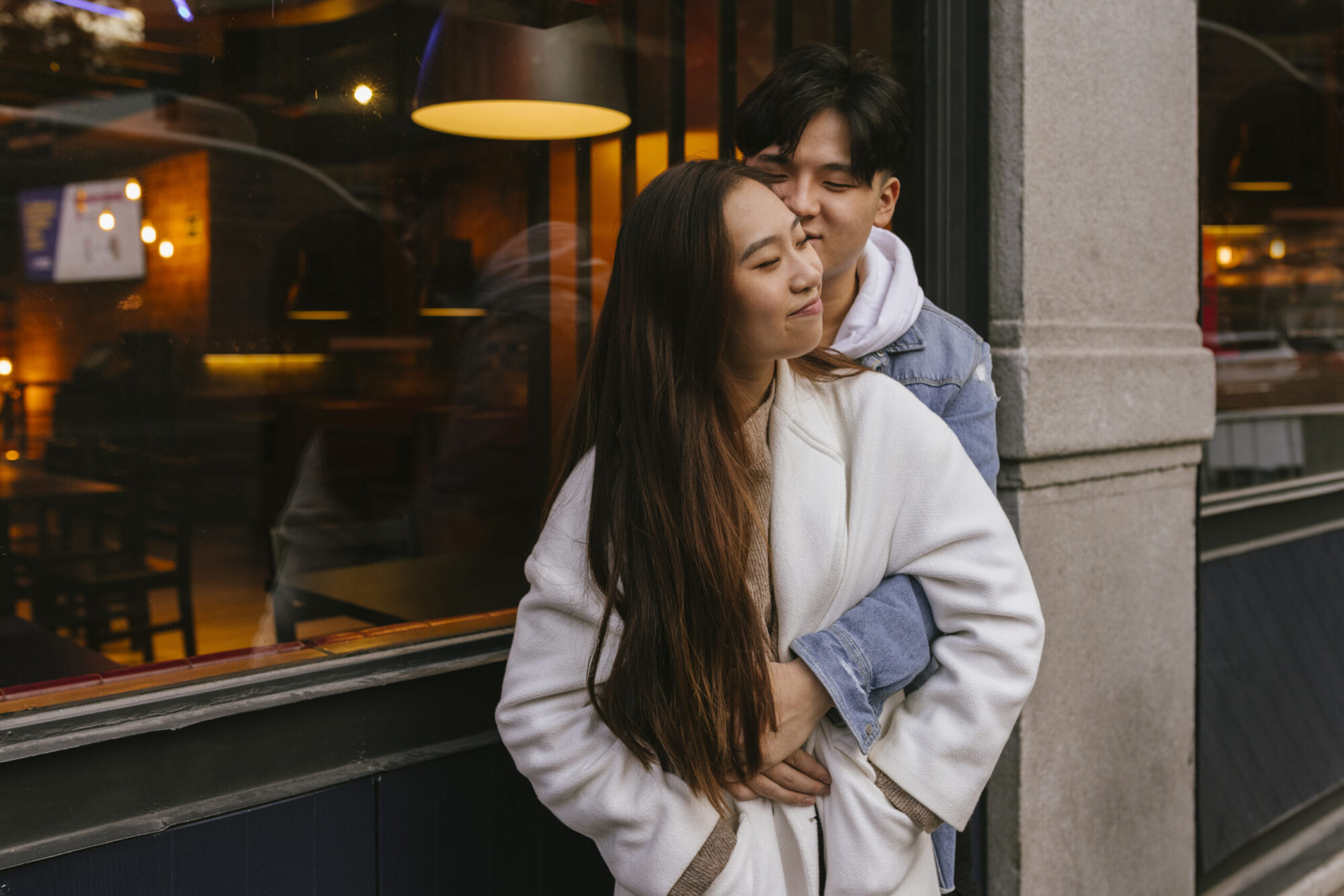 Couple enjoying time together outside a neighbourhood restaurant