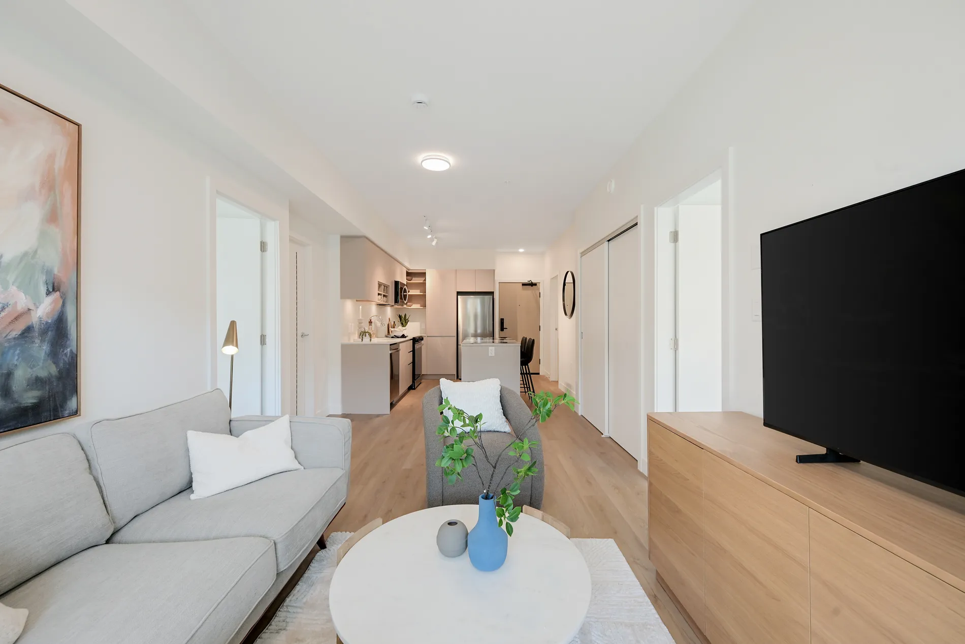Living area of a 2-bedroom rental home at Spencer Block